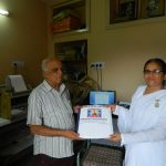 BK Sister Presenting the Braille Book to Blind Person Association at Rajkot,Gujrat.