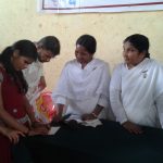 Blind Students Reading Motivational Words of Wisdom in Braille.